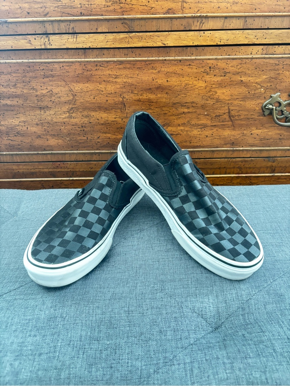 VANS BLACK CHECKERED BOARD SLIP ONS, size 9